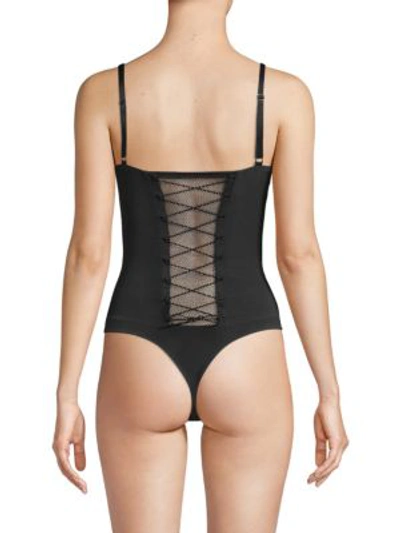 Shop Addiction Nouvelle Lingerie Bottle Caps Bodysuit In Black