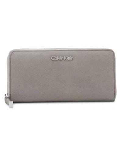Shop Calvin Klein Saffiano Zip Around Wallet In Burnt Orange
