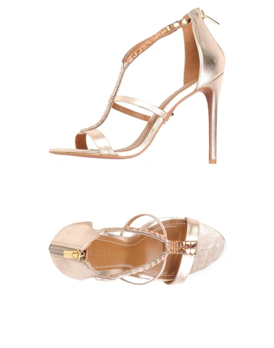 Shop Carrano Sandals In Gold