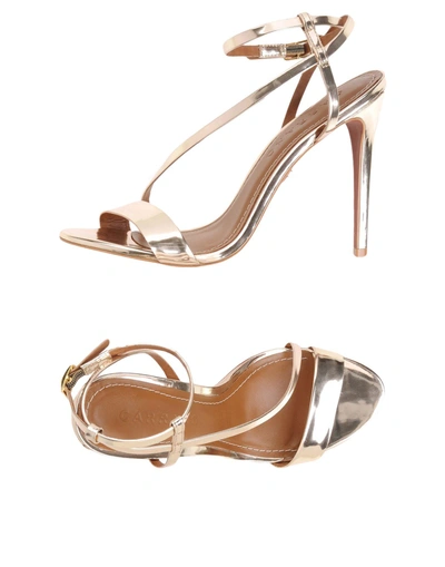 Shop Carrano Sandals In Gold