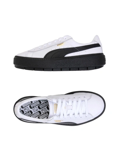 Shop Puma Sneakers In White