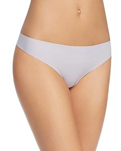 Shop Calvin Klein Invisibles Thong In Bliss Lilac
