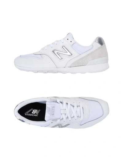 Shop New Balance Trainers In White