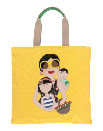 Shop Dolce & Gabbana Handbags In Yellow