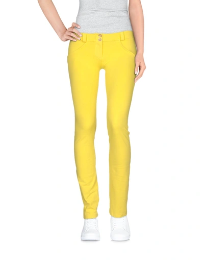 Shop Freddy Casual Pants In Yellow