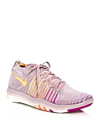Shop Nike Women's Free Transform Flyknit Lace Up Sneakers In Plum/fog/peach