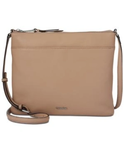 Shop Calvin Klein Lily Pebble Leather Crossbody In Oatmeal/silver