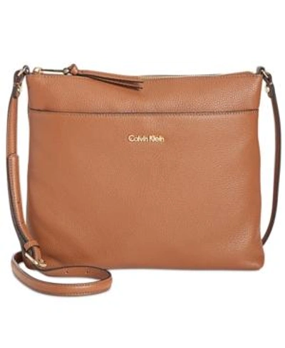 Shop Calvin Klein Lily Pebble Leather Crossbody In Luggage/gold