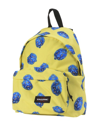 Shop Eastpak Backpacks & Fanny Packs In Yellow