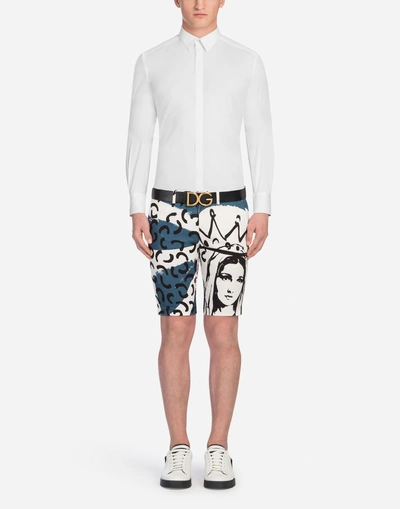 Shop Dolce & Gabbana Printed Cotton Bermuda Shorts In White