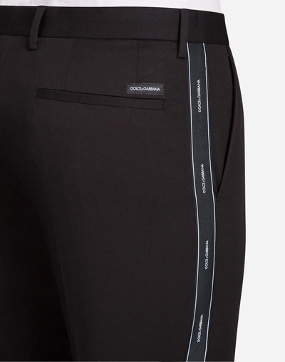 Shop Dolce & Gabbana Printed Stretch Cotton Pants In Black