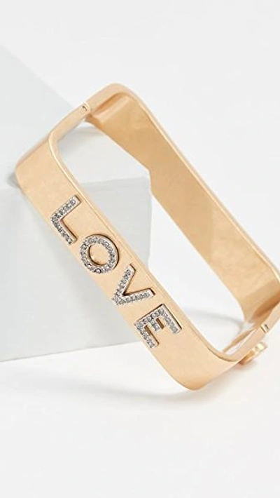 Shop Tory Burch Love Message Bracelet In Yellow Gold