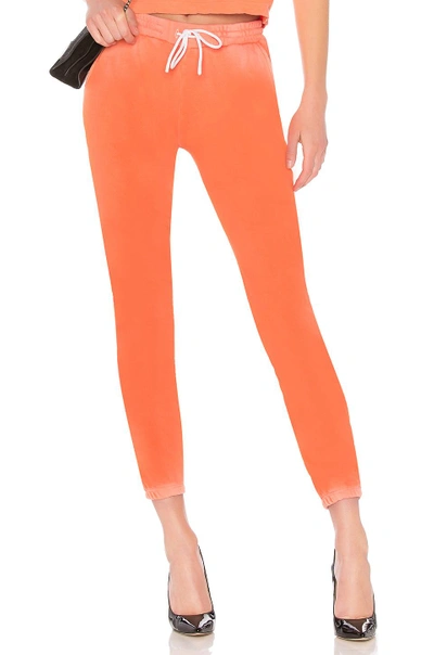 Shop Cotton Citizen Aspen Elastic Bottom Sweats In Orange