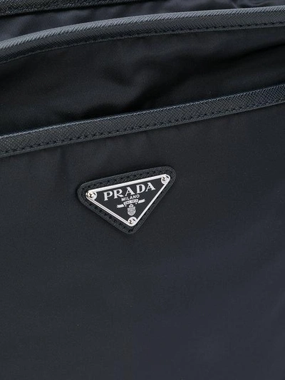 Shop Prada Logo Plaque Messenger Bag In Blue