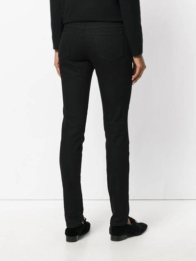Shop Valentino Skinny Jeans In Black