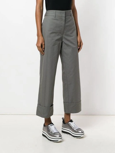 Shop Prada Turn-up Hem Trousers In Grey