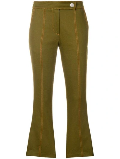 Shop Msgm Cropped Flare Trousers In Green