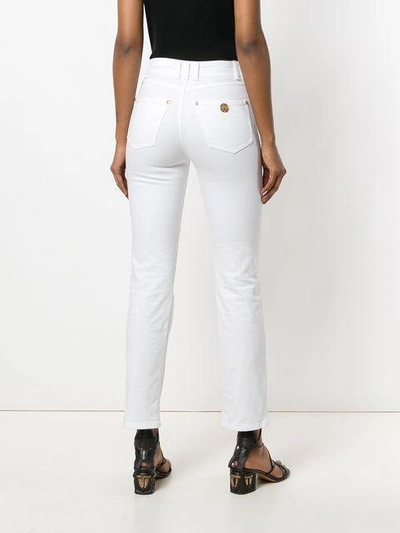 Shop Balmain Double-breasted Trousers - White