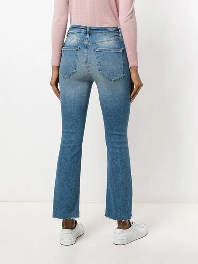 Shop Acynetic Flared Cropped Jeans In Blue