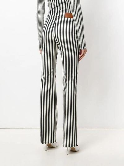 Shop Altuzarra Striped Straight-leg Trousers - Black
