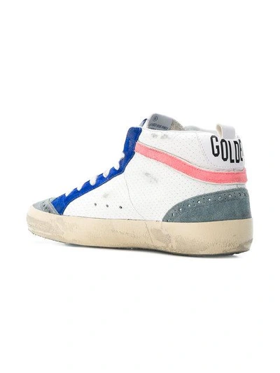 Shop Golden Goose Mid Star Sneakers