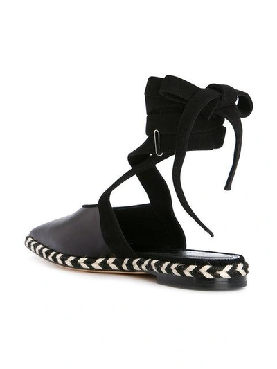 Shop Jw Anderson Wrap Around Mules In Black