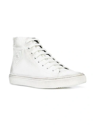 Shop Saint Laurent Logo Lace-up Sneakers In White