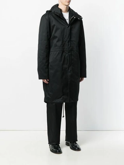 Shop Raf Simons Rear Print Parka In Black