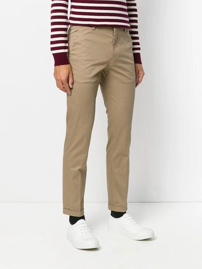 Shop Prada Slim-fit Gabardine Trousers