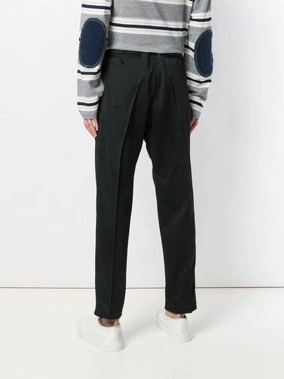 Shop Junya Watanabe Straight Fit Trousers In Black