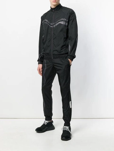 Shop Reebok X Cottweiler Reversible Track Pants - Black