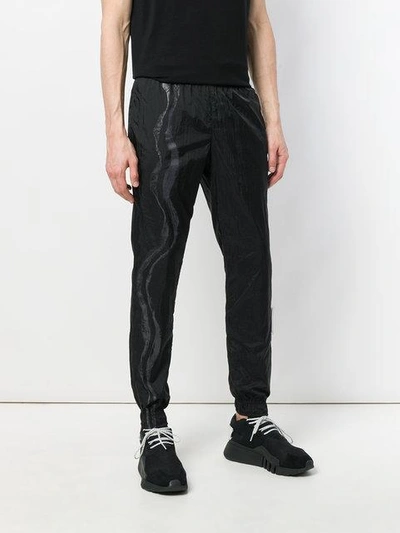 Shop Reebok X Cottweiler Reversible Track Pants - Black