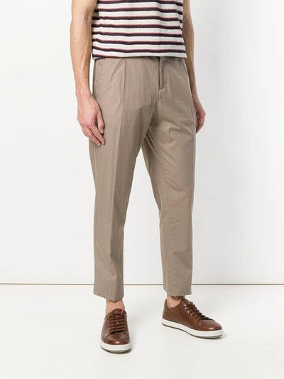 Shop Ferragamo Elasticated Waist Trousers In Brown