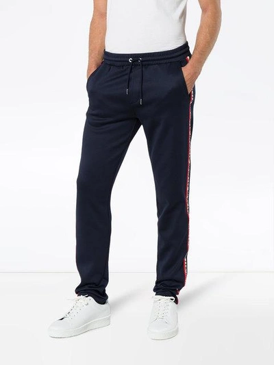 Shop Moncler Side Stripe Logo Track Pants In Blue