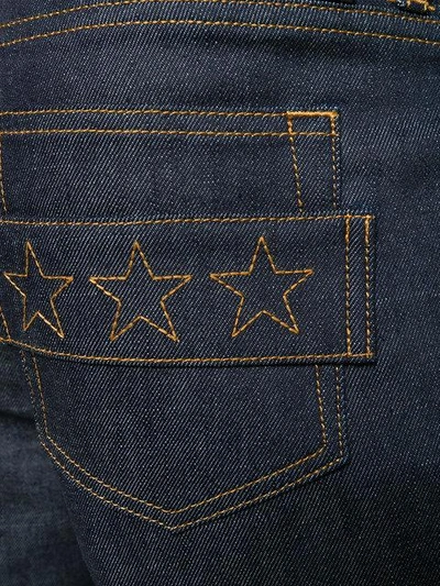 Shop Givenchy Stars Patch Slim Fit Jeans - Blue