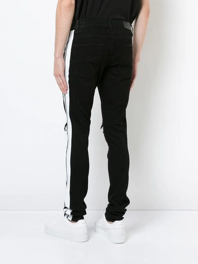 Shop Amiri Track Jeans In Black