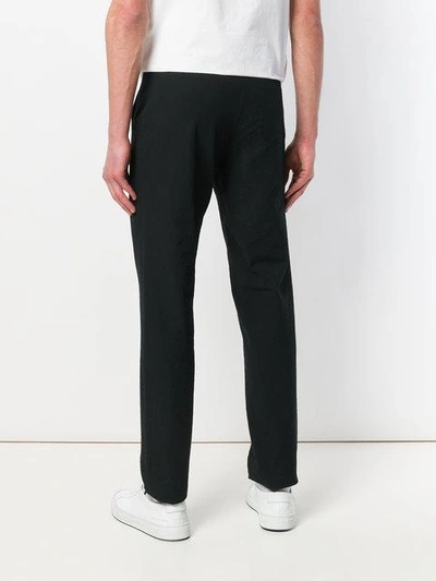 Shop Apc Crease Effect Slim Fit Trousers In Black