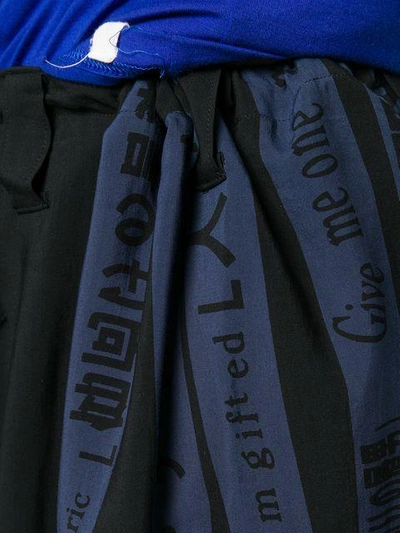 Shop Yohji Yamamoto Print-detail Cropped Trousers