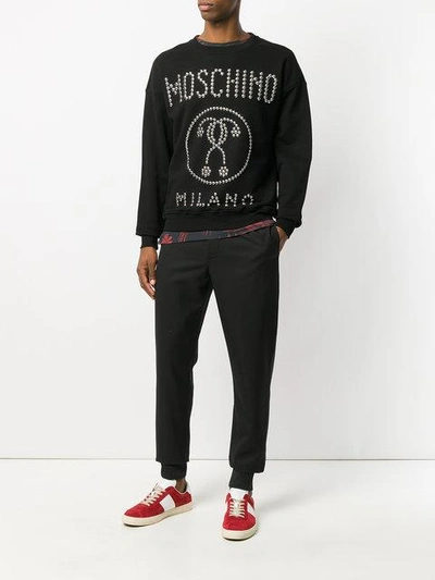 Shop Moschino Logo Studded Sweatshirt - Black