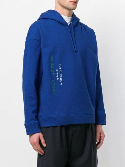 Shop Raf Simons Logo Print Drawstring Hoodie In Blue