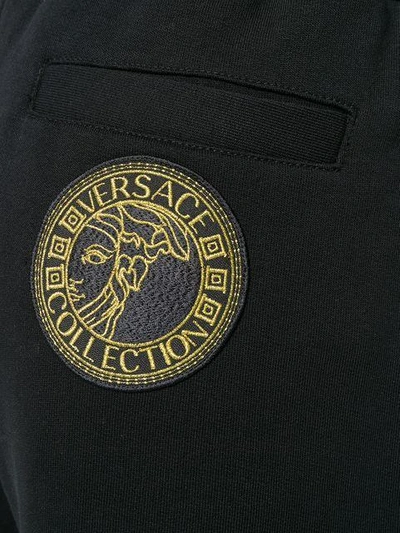 Shop Versace Cuffed Track Pants