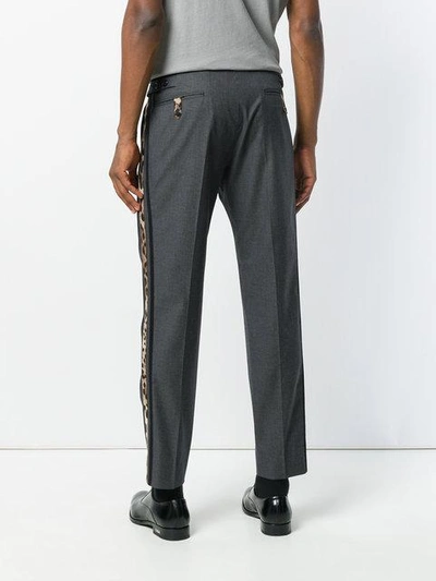 Shop Dolce & Gabbana Leopard Print Stripe Tailored Trousers - Grey