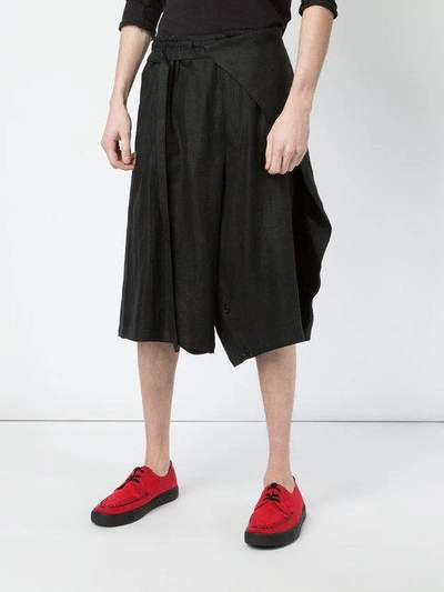 Shop Yohji Yamamoto Asymmetric Front Culottes - Black