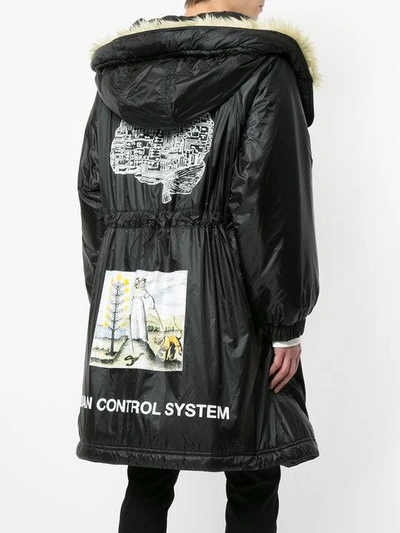 Shop Undercover Oversized Hooded Raincoat In Black