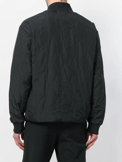 Shop Adidas Originals Adidas Nmd Primaloft Track Jacket - Black