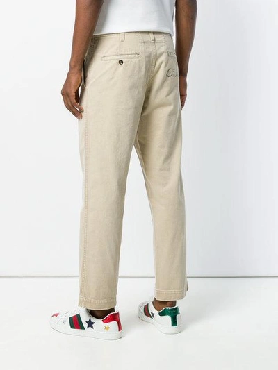 Shop Gucci Cropped Chino Trousers In Neutrals