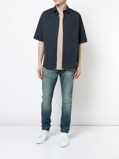 Shop John Elliott Faded Effect Jeans In Blue