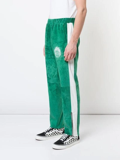 Shop Alchemist Leather Track Pants - Green
