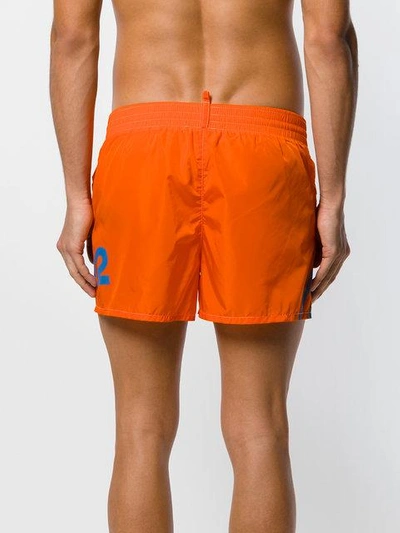 Shop Dsquared2 Dsq Logo Printed Swim Shorts - Orange