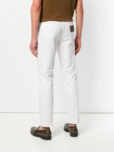 Shop Fendi Embellished Straight Leg Jeans In White